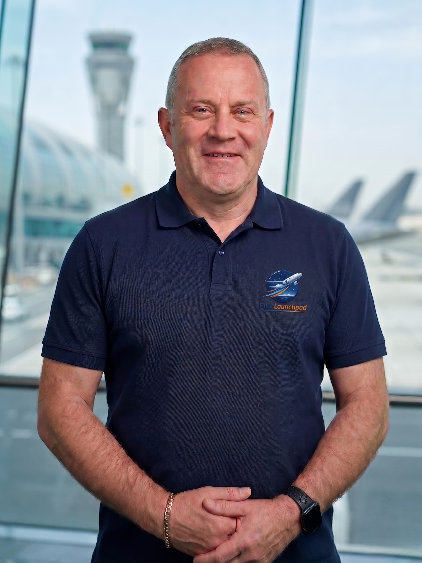 Captain Marcel Suess, Emirates Airline Captain and founder of PilotLaunchpad, standing in full uniform